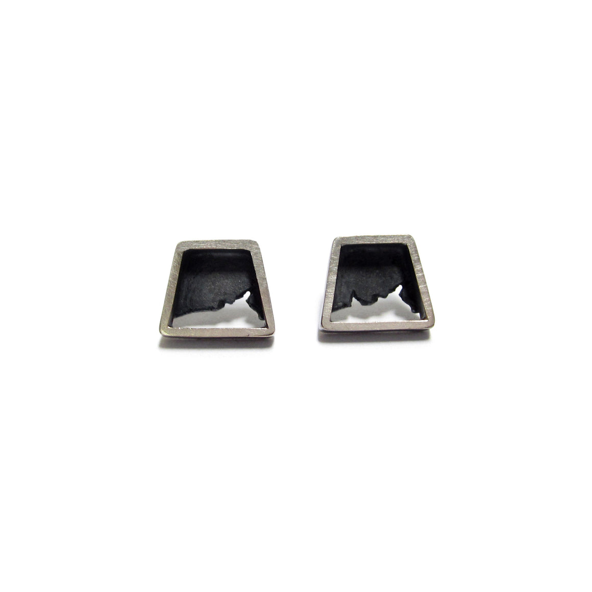 one of a kind silver stud earrings by Seth Papac