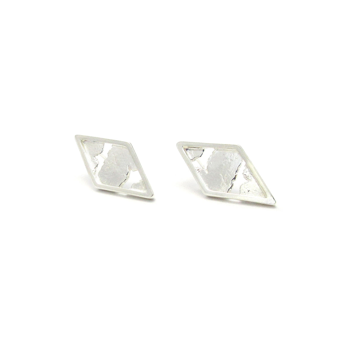 sterling silver torn diamond stud earrings by Seth Papac