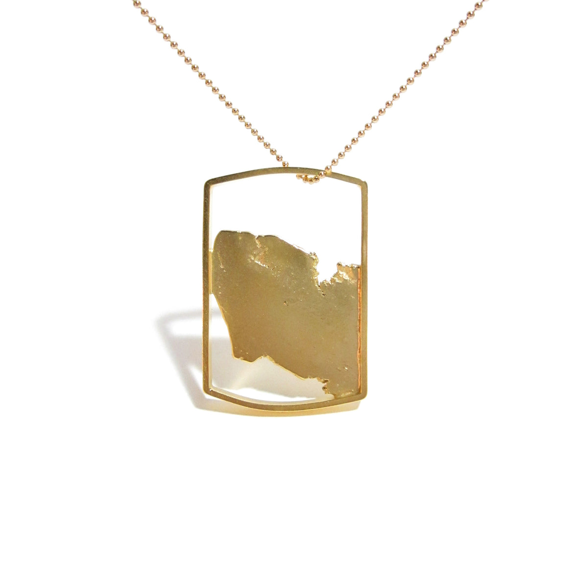 18K gold plated sterling silver tag by Seth Papac